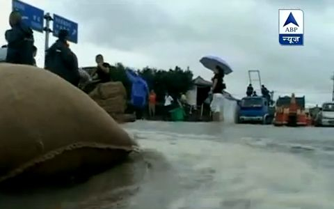 Halottak, romok a Fitow tájfun nyomában